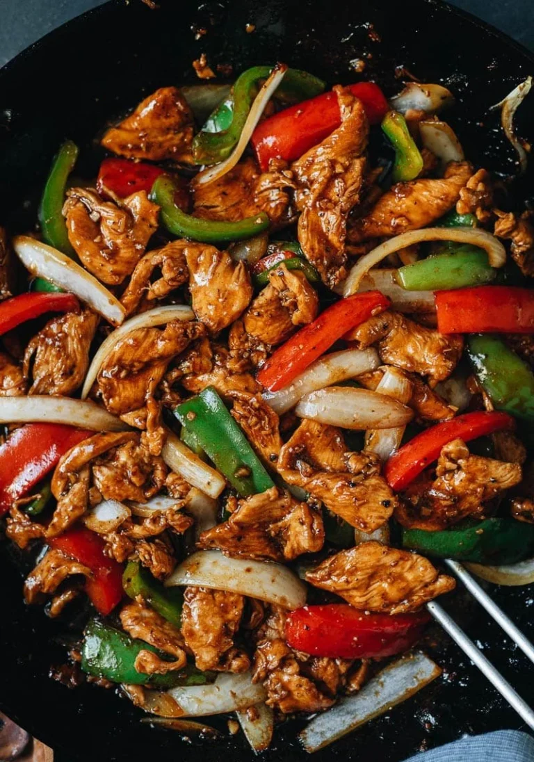 Delicious black pepper chicken served with vegetables on a plate