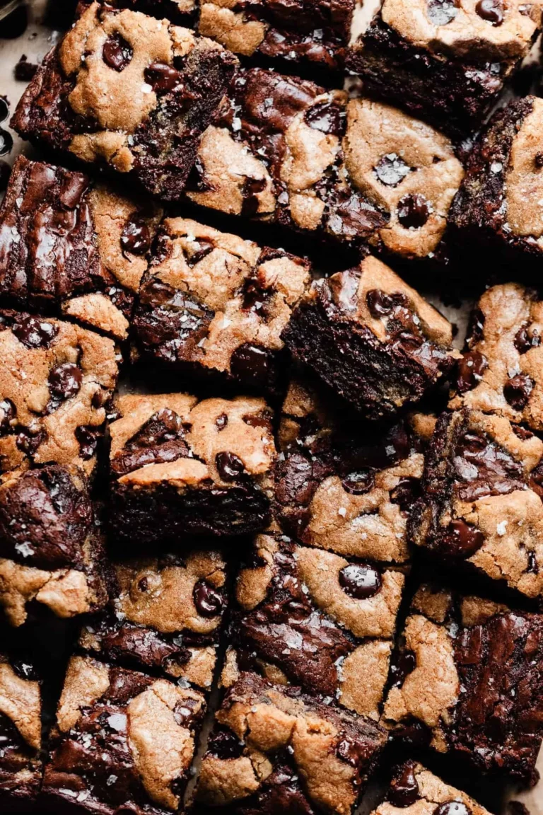 Delicious Brown Butter Brookies stacked on a plate, showcasing rich chocolate and fudgy texture.