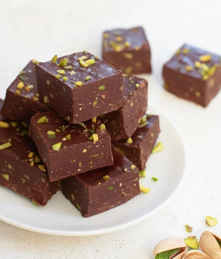 Delicious 2 Ingredient Keto Pistachio Fudge on a white plate