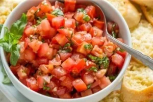 Classic bruschetta with tomatoes and basil on toasted bread