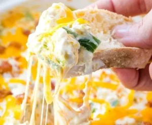 Delicious Jalapeño Popper Dip served in a bowl with tortilla chips