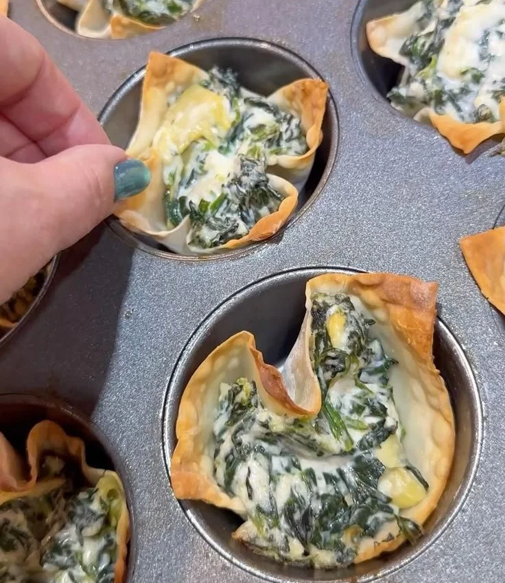 Crispy spinach artichoke wonton cups filled with creamy mixture